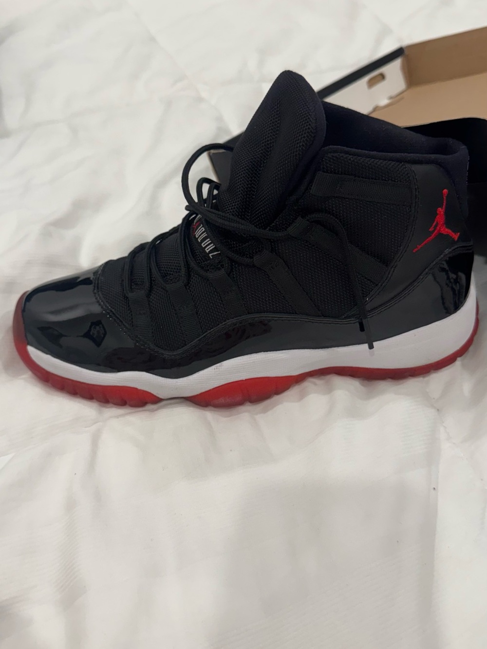 Air Jordan 11 Retro (GS) Black and Red High-Top Sneakers - Picture 3 of 7